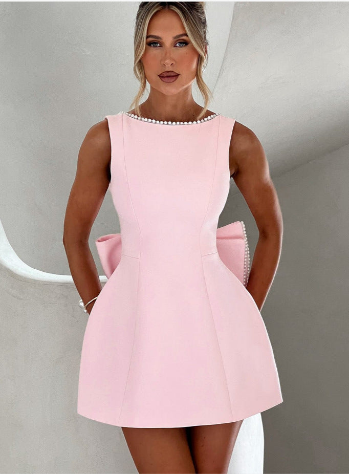 Eclat™ | Mini-robe évasée – Nœud dans le dos et coupe princesse