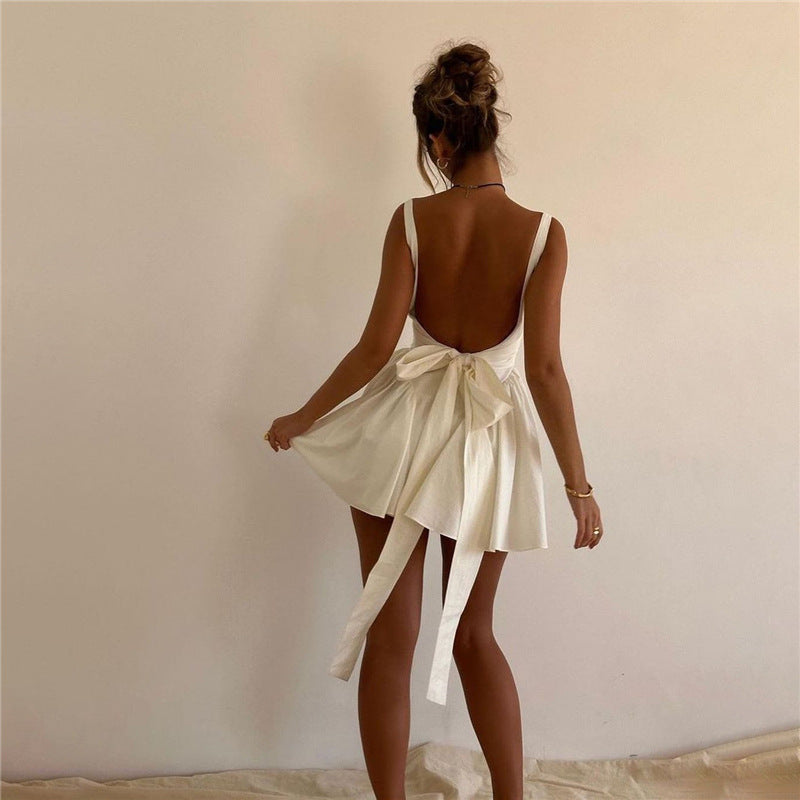 Eclat™ | Robe blanche élégante avec nœud dans le dos – Look estival chic