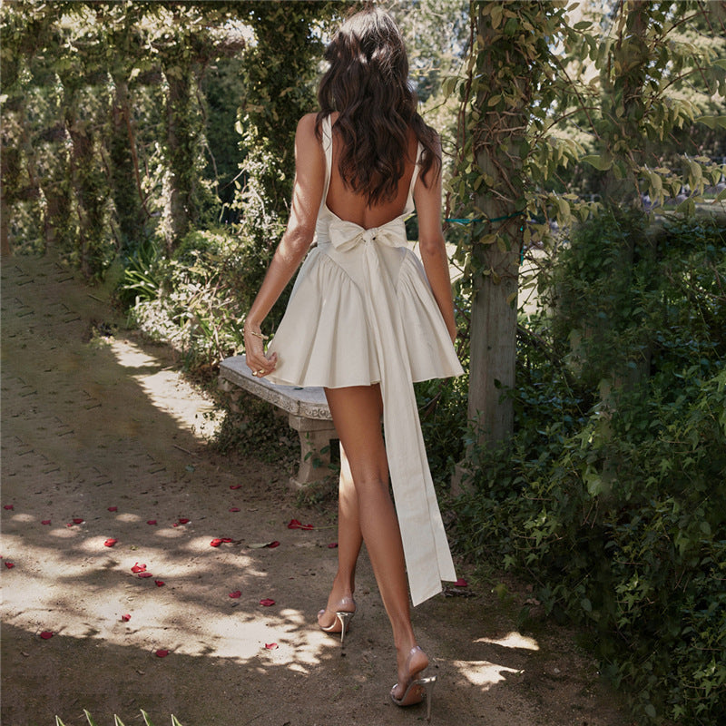 Eclat™ | Robe blanche élégante avec nœud dans le dos – Look estival chic