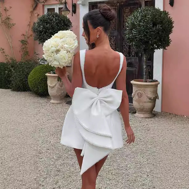 Eclat™ | Mini-robe évasée – Nœud dans le dos et coupe princesse